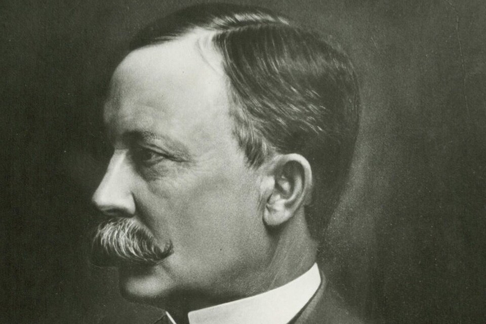 Greyscale portrait of Warren Johnson