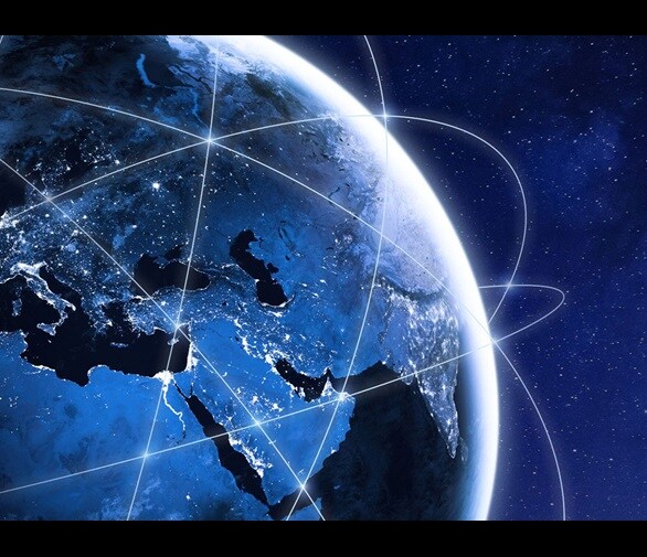 Illustration of Earth at nighttime from space with graphics depicting communication