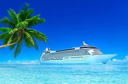 A cruise ship near the beach with a coconut tree
