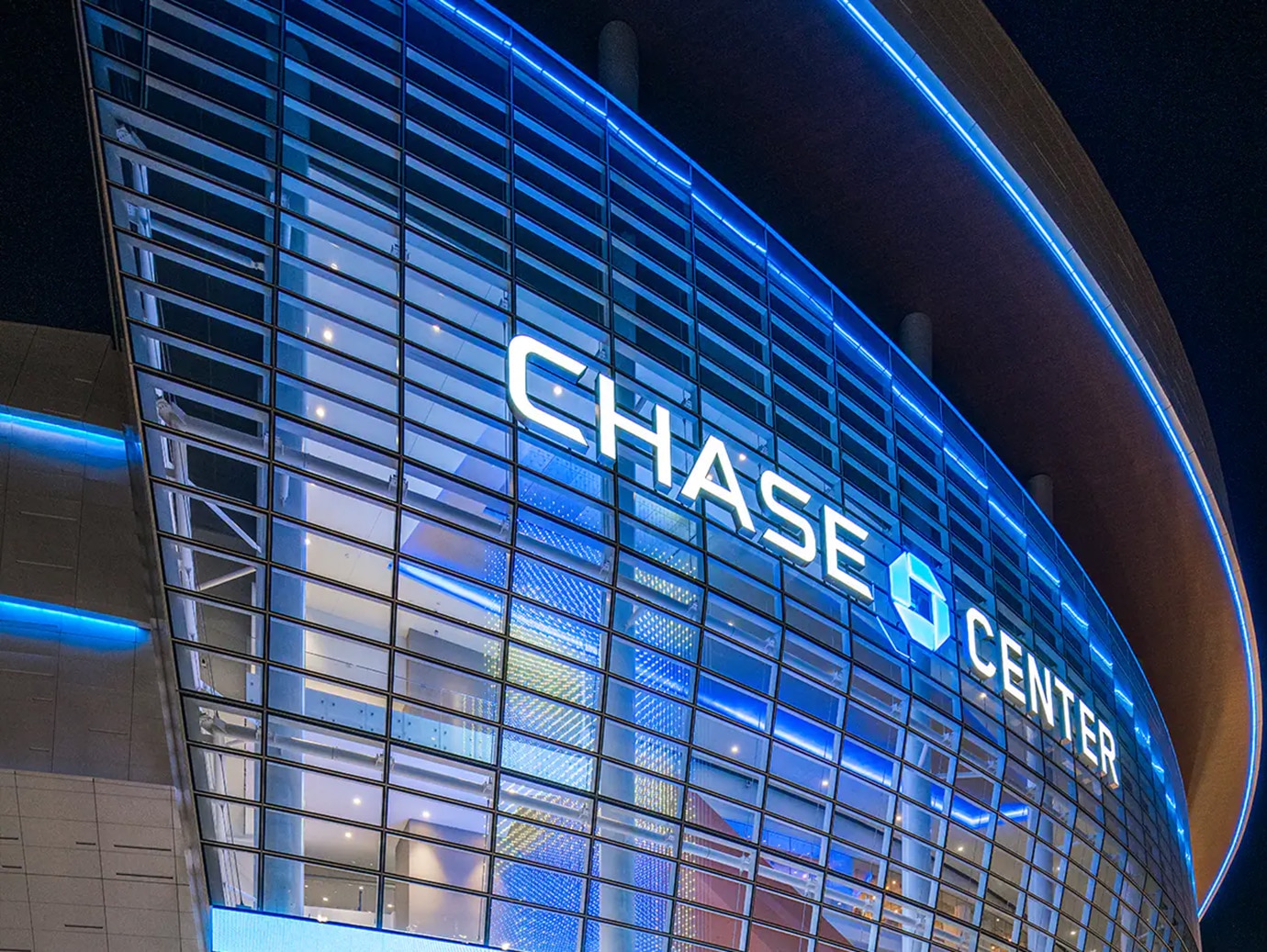 Close-up of the exterior of the Chase Center in San Francisco during night-time