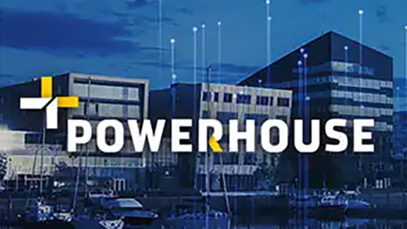 Powerhouse logo overlaid on an image of the Powerhouse Brattørkaia in Trondheim, Norway