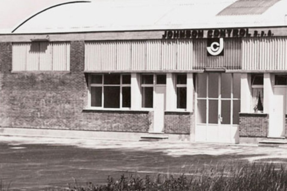 A greyscale image of Johnson Controls' first European manufacturing plant in Lomagna, Italy