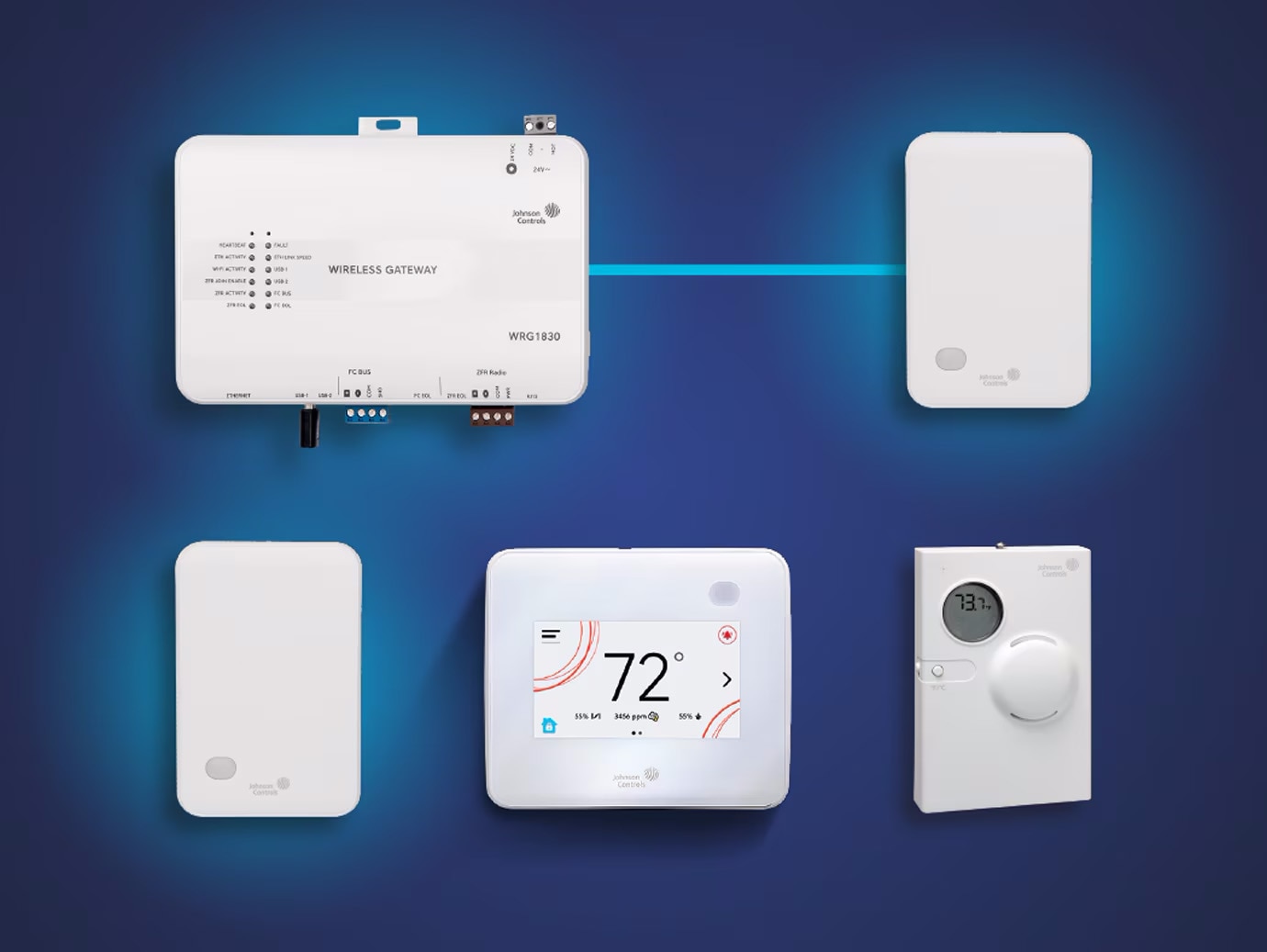 Five Metasys wireless system devices against a blue background