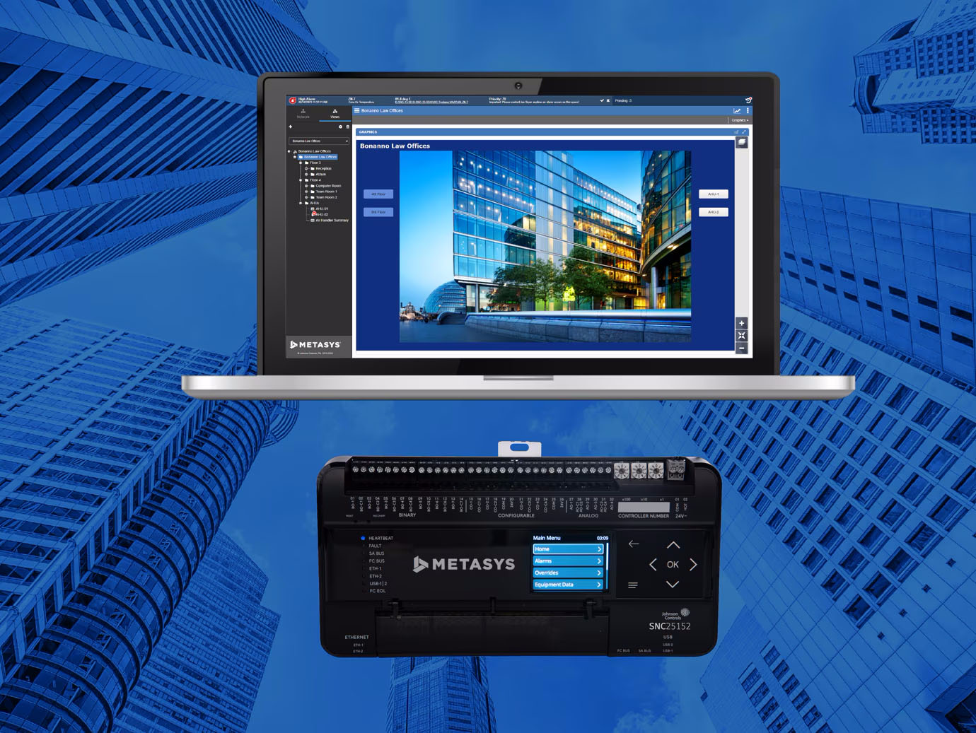 A laptop screen displaying the Metasys interface alongside a Metasys controller overlaid on an image of high-rise buildings