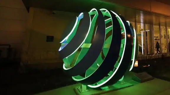 The Johnson Controls Sculpture located outside Fiserv Forum during nighttime