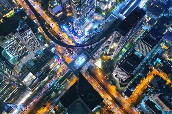 Aerial view of a busy metropolitan city at night