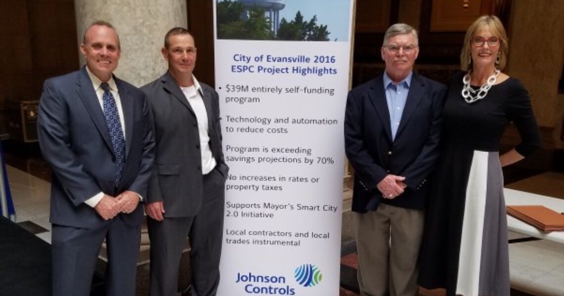 Chris Downs, Daniel Claspell, Duane Gillis and Suzanne Crouch posing for the award for Outstanding Project of the Year from the Indiana Chapter of the Energy Services Coalition (ESC)