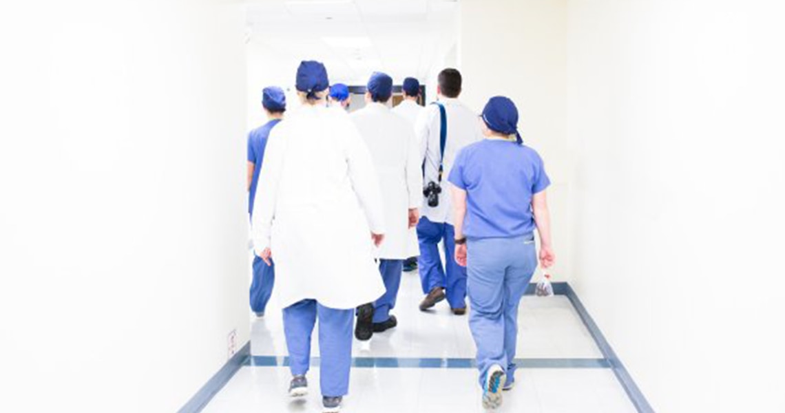 Doctors walking inside medical center