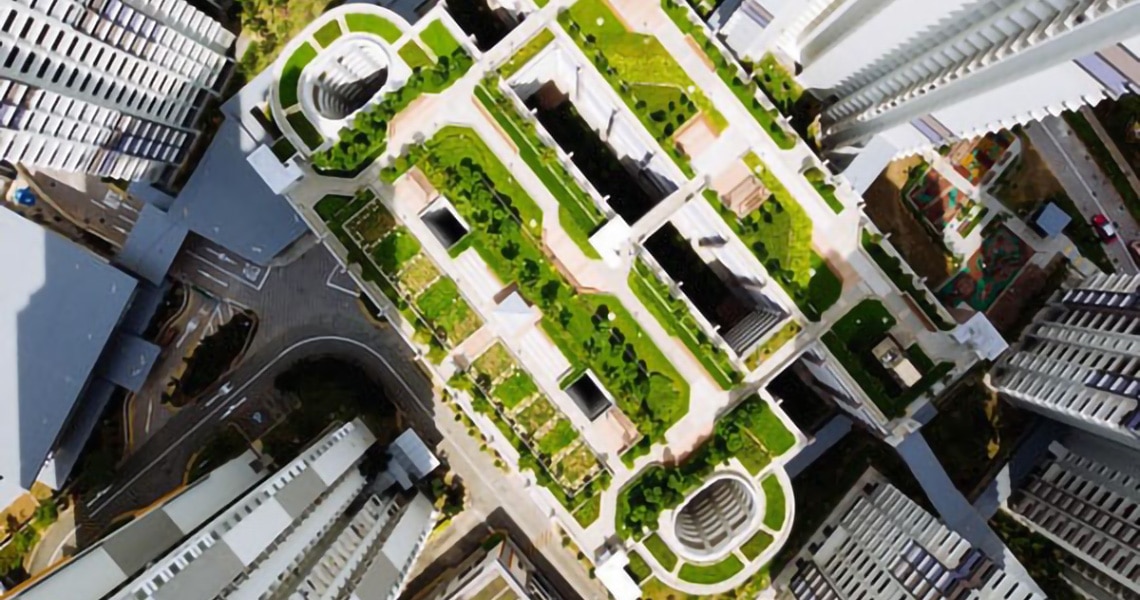 Aerial view of residential skyscraper with green roof