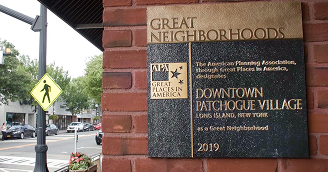 A plaque designating the Village of Patchogue as a Great Neighborhood, awarded by the American Planning Association