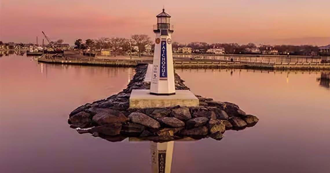 A lighthouse at sunset in the Village of Patchogue