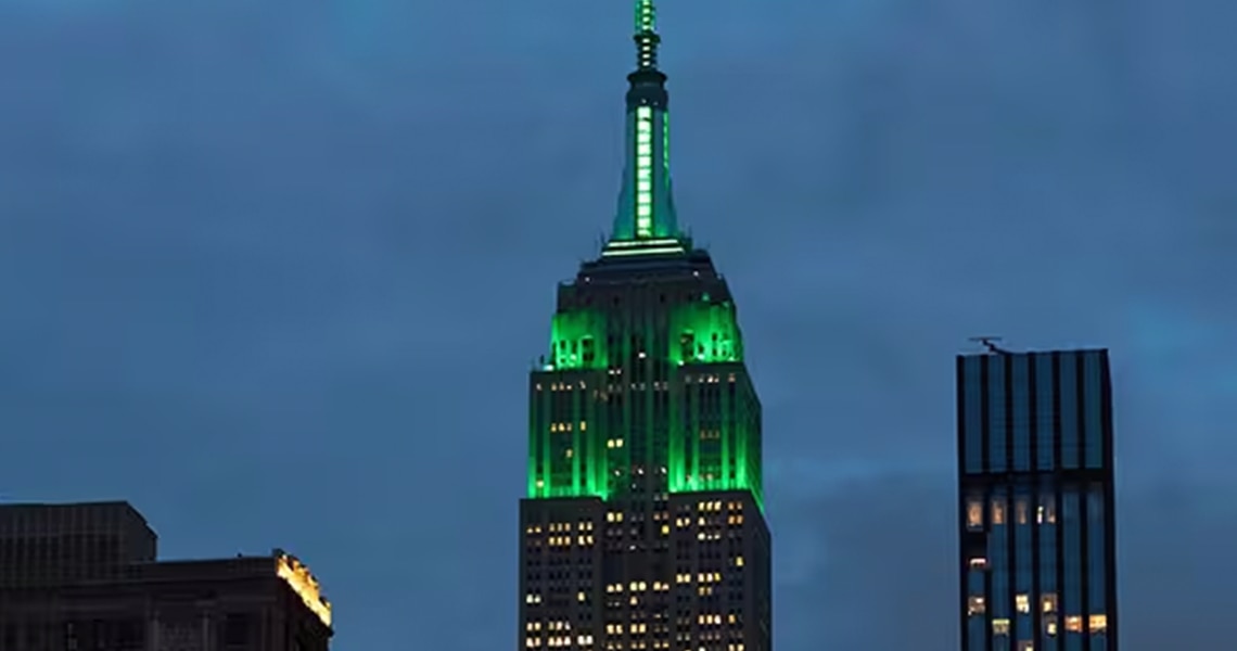 The Empire State Building with green lighting