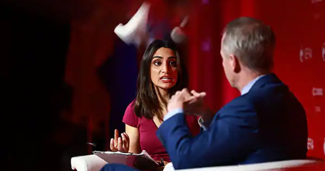 Ritika Gupta interviewing George Oliver, Chairman and CEO, Johnson Controls, at the Toronto Global Forum in 2022