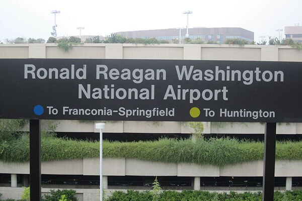 Board with text 'Ronald Reagan Washington National Airport'