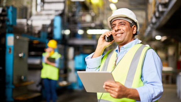 A engineer talking on mobile