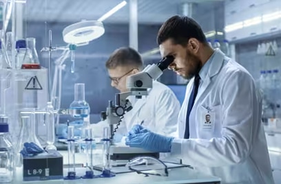 Two men in lab coats working in a laboratory