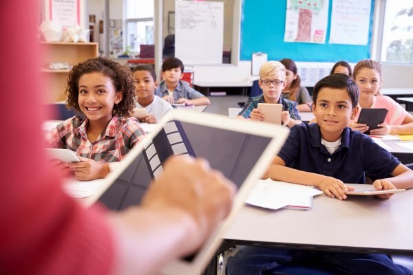 Elementary students sitting in a classroom