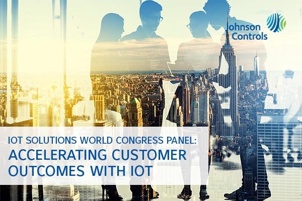 A cityscape overlaid with silhouettes of people talking, a banner for IoT solutions and the Johnson Controls logo