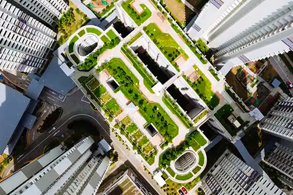 Aerial view of residential skyscraper with green roof