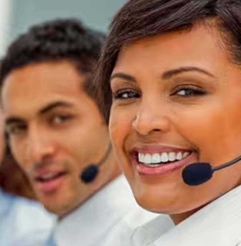 Call center workers smiling